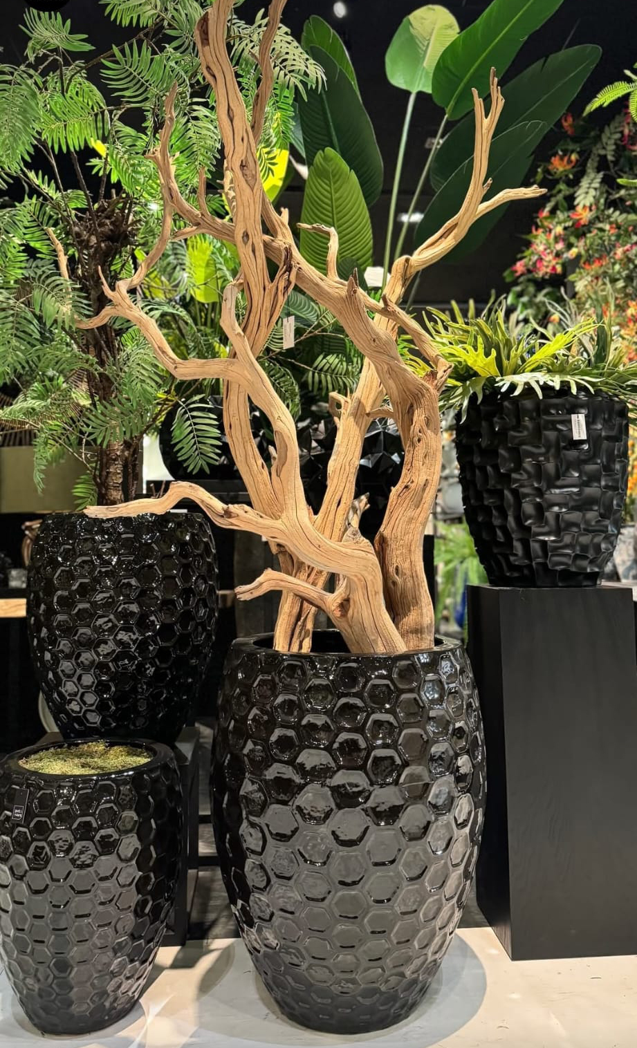 Hout bloemstuk met vaas